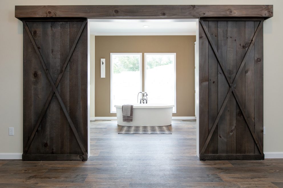 Southern Charm Barn Doors open to the living room